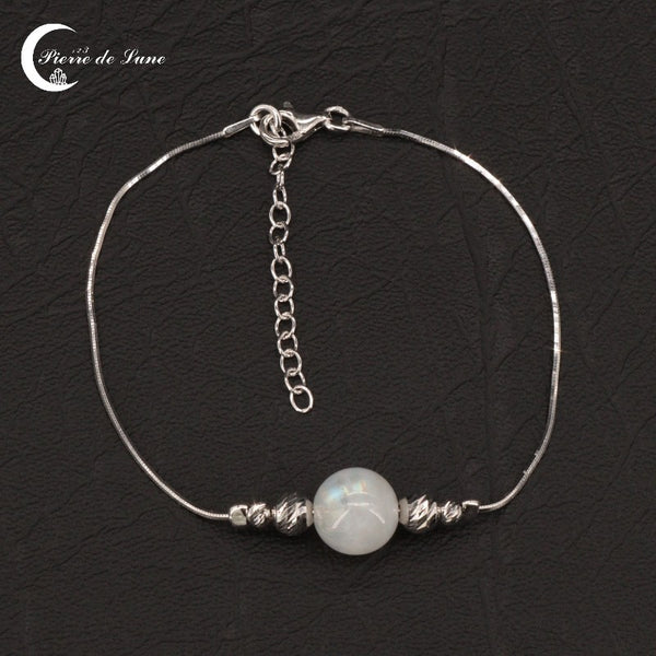 Bracelet femme ajustable (Eos) avec une seule grande perle de Pierre de Lune naturelle.