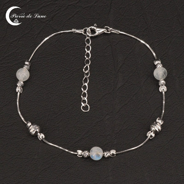 Bracelet femme (Erato) en Pierre de Lune naturelle et argent rhodié, design symétrique.