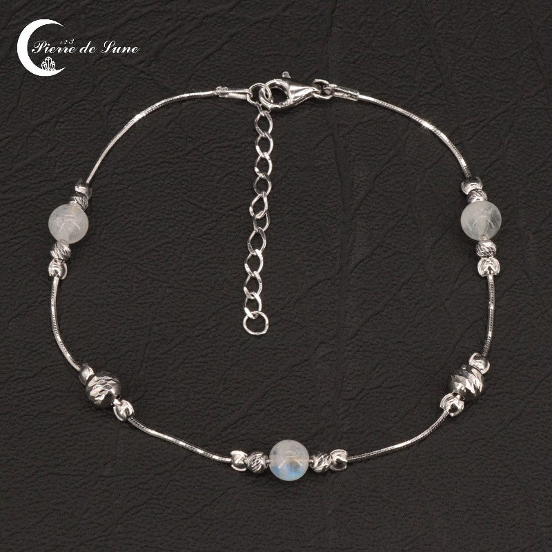 Bracelet femme (Erato) en Pierre de Lune naturelle et argent rhodié, design symétrique.