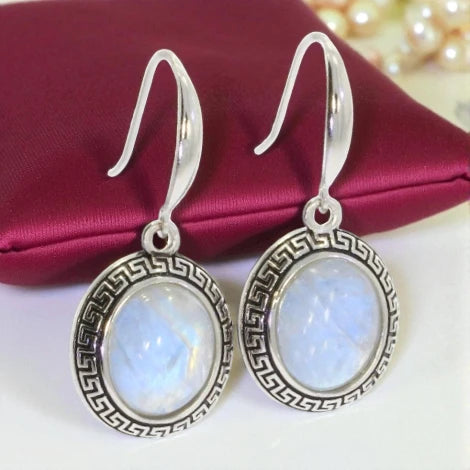 boucles d'oreilles avec pendant pierre de lune, style moderne, superposition élégante