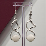 Boucles d'oreilles pierre de lune facettées argent 925 (Hélios)