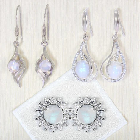 Boucles pendantes goutte en pierre de lune, finition argent, mouvement délicat