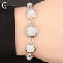 Bracelet Pierre de Lune (Calliope) argent 925 avec 5 cabochons ronds gradués (10, 8, 6mm).