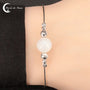 Bracelet Pierre de Lune (Eos) avec perle unique de 10mm sur chaîne fine en argent 925 rhodié.