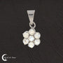Qualité artisanale du Pendentif Pierre de Lune (Marguerite), bijou en pierre naturelle.