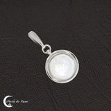 Reflet captivant de la pierre de lune ronde du Pendentif (Rhodos) 12mm.